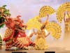 Performers depicting Golden Peacocks and the mythical Qilin bring blessings of purity and serenity to the stage in Los Angeles.