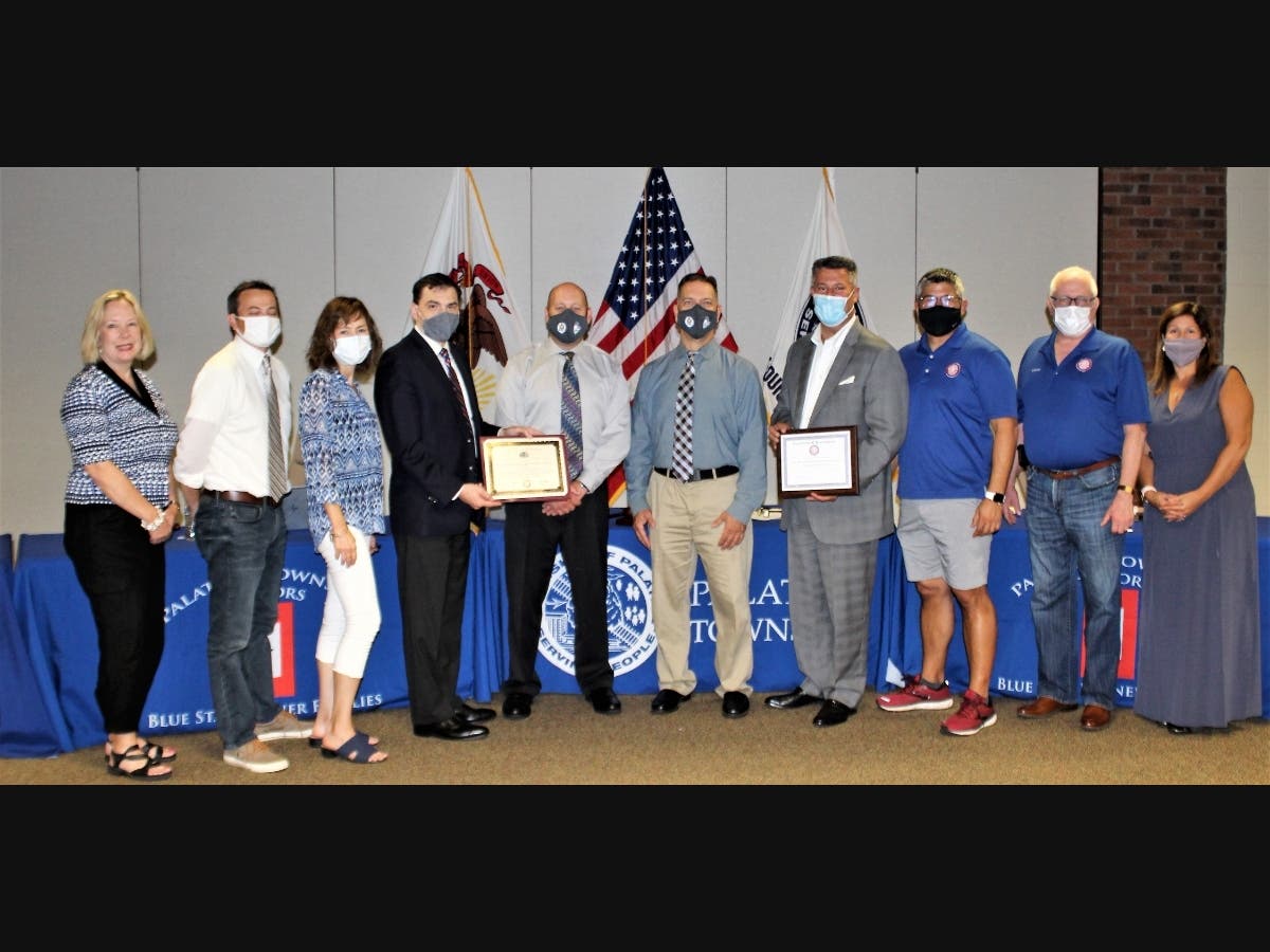 L-R Trustee Svenson, Trustee Smolka, Clerk Moran, Representative Morrison, Principal  Dietz, Assistant Principal Rice, Supervisor Kalkounos, Highway Commissioner Del Mar, Trustee Pohlman and Trustee Bolanos