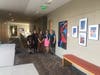 Staff and students with their artwork