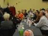 Local magician Jaime Aponte (left, standing) entertained guests and had several audience members assist him with some of his illusions at Orland Township’s Senior Halloween Luncheon.