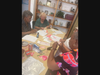 United Women in Faith assembling Breast Cancer Awareness Pins