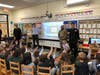 Active and retired members of the Armed Forces visited classrooms to answer students' questions about being in the military.