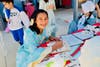 Westhoff Elementary fifth graders learn calligraphy skills during 29th annual Colonial Faire.
