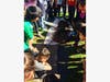 Vejar Elementary kindergartners watch the river flow into the dam they built outside the classroom. 