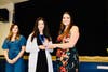 PLTW teachers present awards of achievement during the White Coat Ceremony held on April 23. 