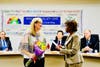 Ron Hockwalt Academies parent Kristine Chala receives Partner in Education recognition.