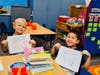Vejar Elementary transitional kindergarten students create keepsake handprint pictures