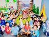 Camp Learn A Lot! Maple Hill Elementary third graders with teacher Lisa Peterson gather around the camp fire. 
