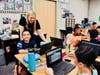 Maple Hill Elementary fifth graders utilize technology to help establish classroom communities.
