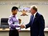 Suzanne Middle School 8th grader Calvin Chen presented with Super Star Student Award. Shown with Board President Larry Redinger.