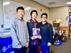 Diamond Bar High students Ryan Lim, Logan Tang, and Esai Rodriguez, show PrintedWorks latest product, a girls basketball program.