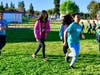 Walnut Elementary 100 Mile Club members sprint, jog, and walk laps on Feb. 27