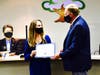 Board President Larry Redinger recognizes Collegewood Elementary parent Maggie Baca with Partner in Education Award. 