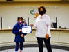 Quail Summit Elementary fourth grader Anjelica Liu presented with Super Star Student Award on Feb 17