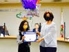 C.J. Morris Elementary fifth grader Gianna Shelby receives Super Star Student Award during March 17 Board Meeting. Shown with Board President Layla Abou-Taleb.