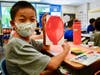 Catching Good Thoughts! Quail Summit Elementary third graders choose positive words during SEL balloon art lesson on Aug. 26