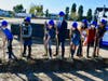 Principal Robert Chang and student leaders commemorate groundbreaking of new multipurpose and classroom building.
