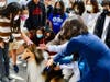 Pawsitively Perfect! Therapy dogs bring comfort and smiles during a lunchtime visit at South Pointe Middle School on March 29.  