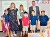 C.J. Morris Elementary Principal Kelly Morris, teacher Megan Cowles, and students welcome Superintendent Dr. Robert Taylor on the first day of school. 
