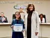 Walnut Elementary fifth grader Viviana Giannone receives the Super Star Student Award during the February 15 Board Meeting. 