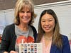 Full Circle Moment! New Castle Rock Elementary Principal Dr. Elizabeth Chang receives class picture from her third-grade teacher Jackie Brown, who has been serving as the school’s interim principal. 