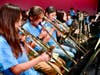 The Walnut High School Band Buddies takes the stage during rehearsal on April 12. 