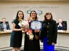 Trustees presented Community Club President Lorena Huang with the Partner in Education Award during the April 19 meeting. 
