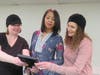 Jeanette Engret, Linda Windham and Sheryll Crider appraise the Buddy Holly Tickets from their Great Grandpa