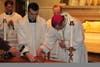 Bishop Caggiano sealed the box in wax with his ring. 