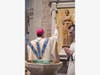 Bishop Caggiano blesses the St. Joseph Shrine with Holy Water