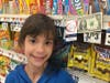 St. Catherine of Siena School 5th grader Siena leaves $1 in the candy aisle at Stop & Shop with the intention that it brightens someone’s day.