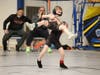A Litchfield Youth wrestler lifts his Bow Brawlers opponent