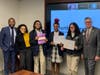 From left are: Principal Wynton Borders; student advisor Genesys Olivares; students Saniyah King, Saidiah 'Saki’ Peay and Diani Rivas; and Fairfield Region President Bill Jennings.