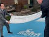 Mayor Joe Ganim (left) and Hartford HealthCare Fairfield Region President Bill Jennings reveal the freshly painted blue Bank Street