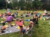 Movie Night in McMichael Park brought in over 100 guests to enjoy the film, Moana, under the full moon.  Priceless!
