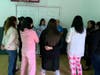 Teachers learn stress management strategies for improved job satisfaction during Dr. Trevicia Williams' seminar.