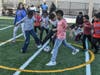 Youth at the Boulder Highway Clubhouse play soccer on their new multi-use soccer field.