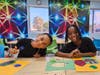 There are a variety of creative outlets for youth during the Boys & Girls Summer Program. Pictured are youth making colorful creations in the Arts & Crafts room. 