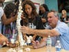 Tom Reeg, CEO, Caesars Entertainment, works with Boys & Girls Clubs of Southern Nevada kids in creating their marshmallow tower.