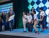 Chris Heavy, UNLV officer in charge, presents an excited Super Cane team from Martin Luther King Jr. Elementary School with the first prize check of $9,000 in UNLV scholarship funds. 