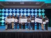 Pictured are the Junior Achievement of Southern Nevada new business contest winning teams – (from left) Martin Luther King Jr. ES, first; Gene Ward ES, third; and Fay Herron ES, second – and the event emcee, judges and JASN president and CEO.