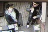 The police are seeking the public's assistance in identifying two individuals in connection with vehicle burglaries.