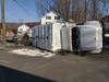 A section of Route 39 was shut down on Sunday following an accident that left a truck overturned and leaking oil.