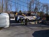 A section of Route 39 was shut down on Sunday following an accident that left a truck overturned and leaking oil.