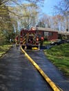 Brookfield firefighters extinguished a two-alarm blaze at a residence on Monday.