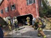 Brookfield firefighters extinguished a two-alarm blaze at a residence on Monday.