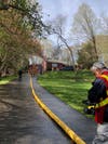 Brookfield firefighters extinguished a two-alarm blaze at a residence on Monday.