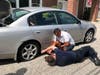 Three EMS crewmen and Cpl. Chris Campbell of the Brookfield PD and off-duty at the time stepped up to help change an elderly woman's tire.