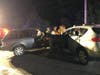 Firefighters cleaned up a fluid spill in the area of the accident that shut down Weston Road for over an hour.
