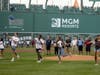 Recipients of 2019 Red Sox Service Scholarships throw ceremonial first pitches during pregame ceremonies before the Boston Red Sox’s game against the Tampa Bay Rays at Fenway Park on Tuesday, July 30, 2019.   
